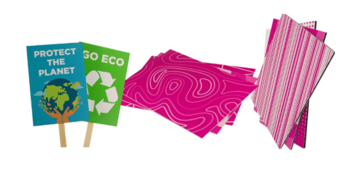 A composition of sustainable signage created with eco-friendly materials from Carrick Signs